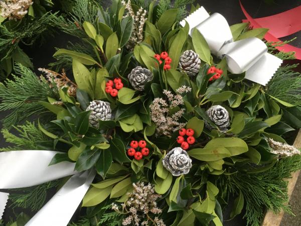 fresh holly berries silver cones white sprigs silver ribbon
