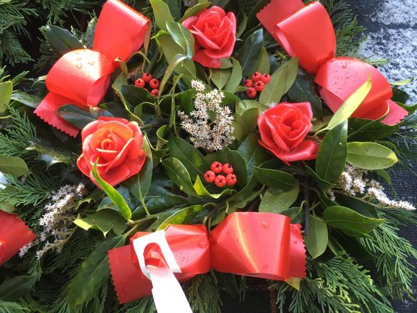 fresh holly red roses berries white sprigs red ribbon